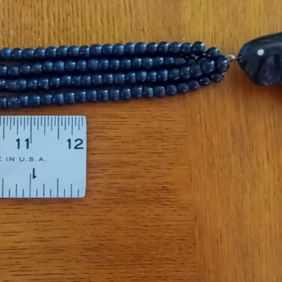 Carved Parrot Necklace with Hinged Compartment - Picture 8 of 9